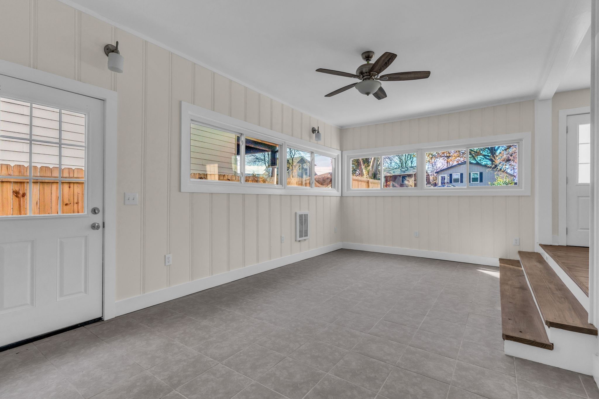 126 Eagan Circle Madison, TN 37115 - Photo 20 of 28 a view of a livingroom with a ceiling fan & windows