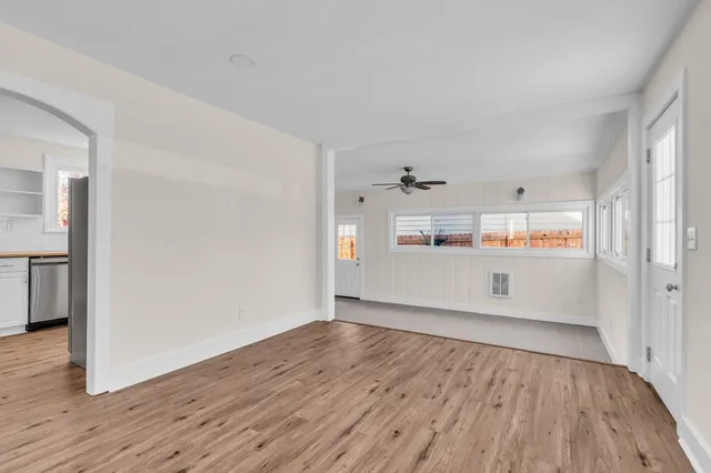 a view of kitchen with wooden floor