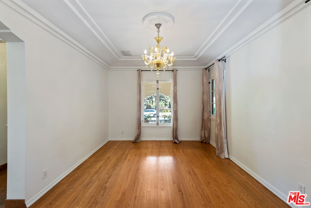 357 South La Peer Drive Beverly Hills, CA 90211 - Photo 9 of 31 a view of entryway with wooden floor
