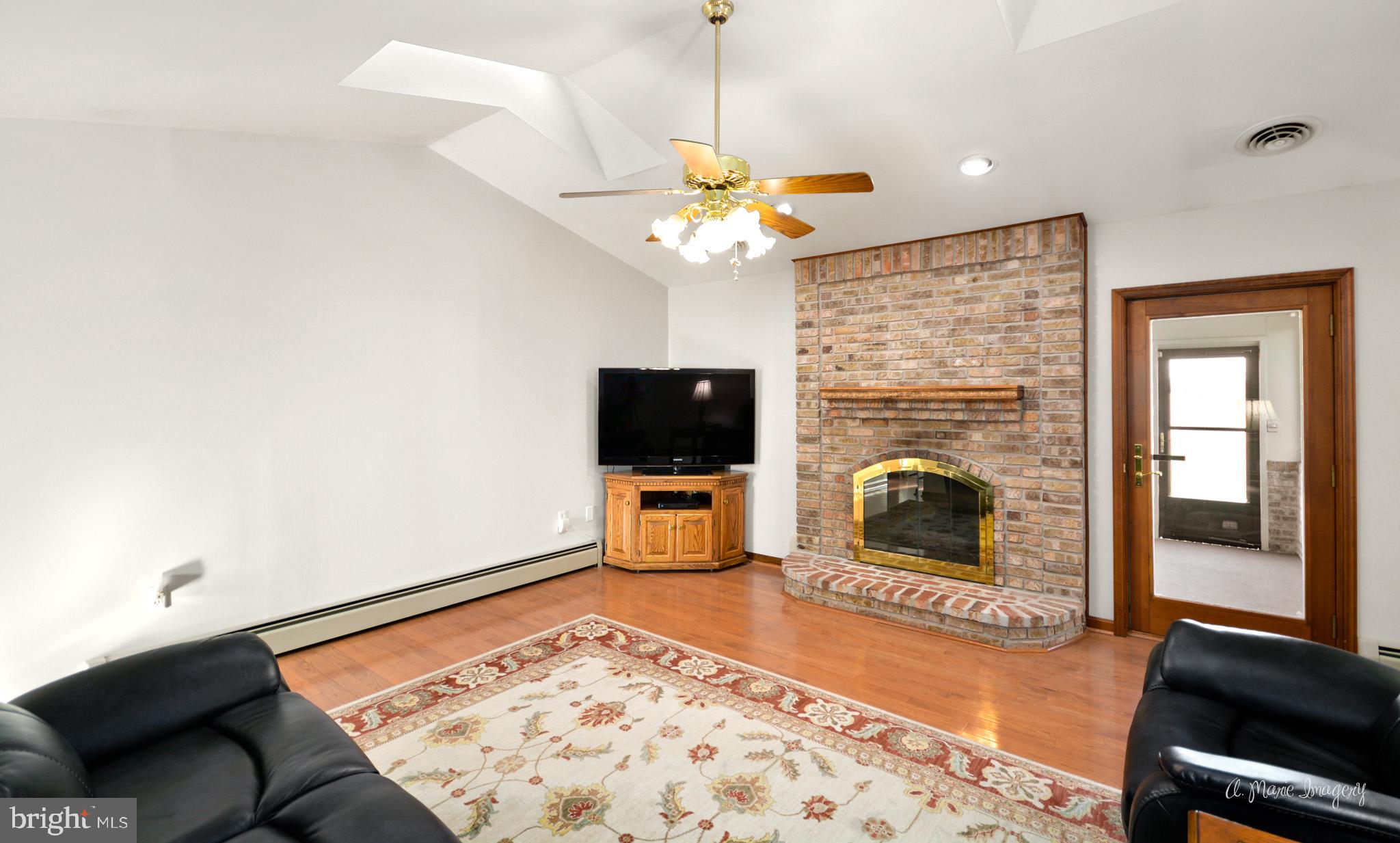 1944 John Shirk Road Taneytown, MD 21787 - Photo 24 of 59 Masonry fireplace with gas logs