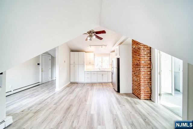 334 South Broad Street, Unit B Ridgewood, NJ 07450 - Photo 3 of 9 a view of an empty room with a window