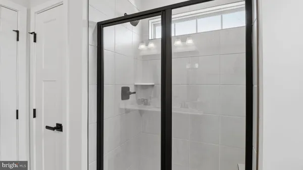 a bathroom with a sink toilet and mirror