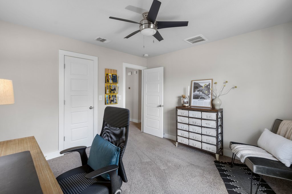 610 Bernstein Street, Unit 14 Austin, TX 78745 - Photo 26 of 39 a room with a workspace