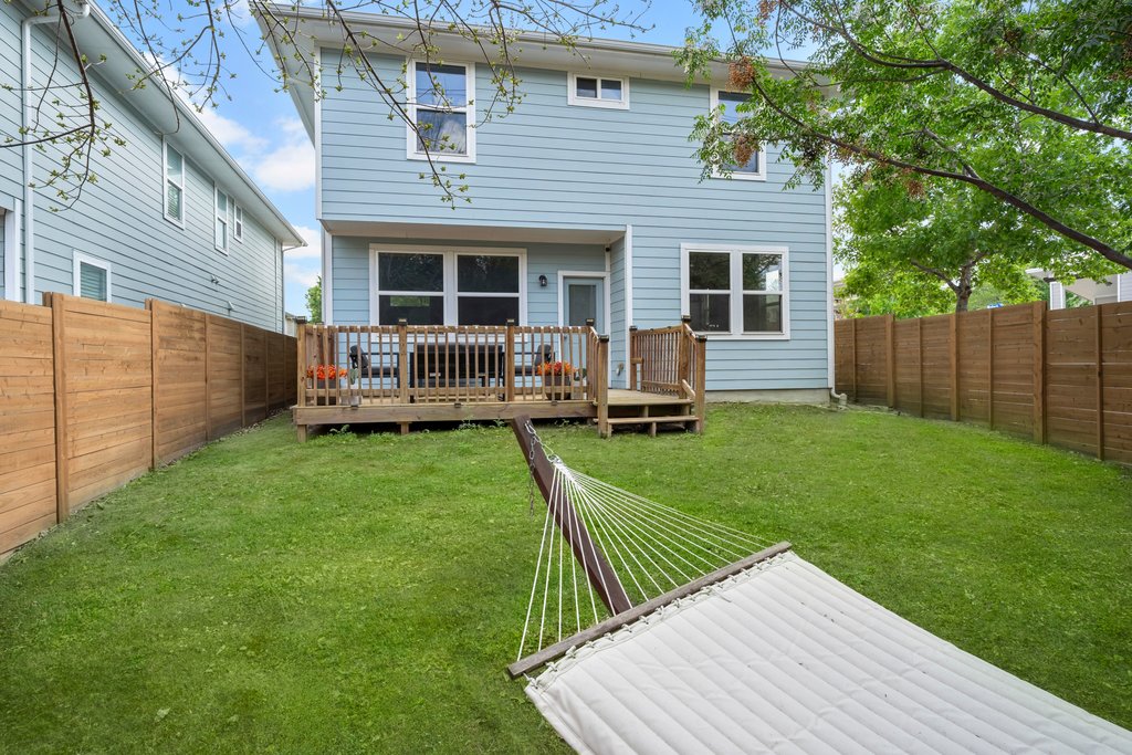 610 Bernstein Street, Unit 14 Austin, TX 78745 - Photo 34 of 39 a house view with a sitting space and garden