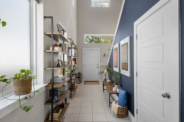 a hall way with furniture