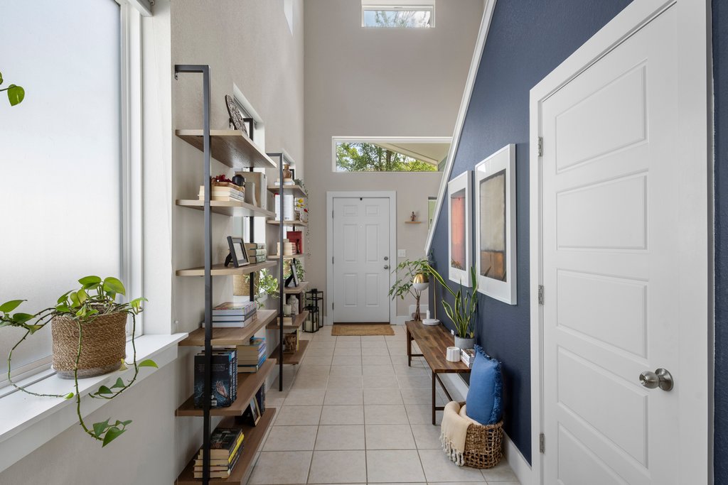 610 Bernstein Street, Unit 14 Austin, TX 78745 - Photo 4 of 39 a hall way with furniture