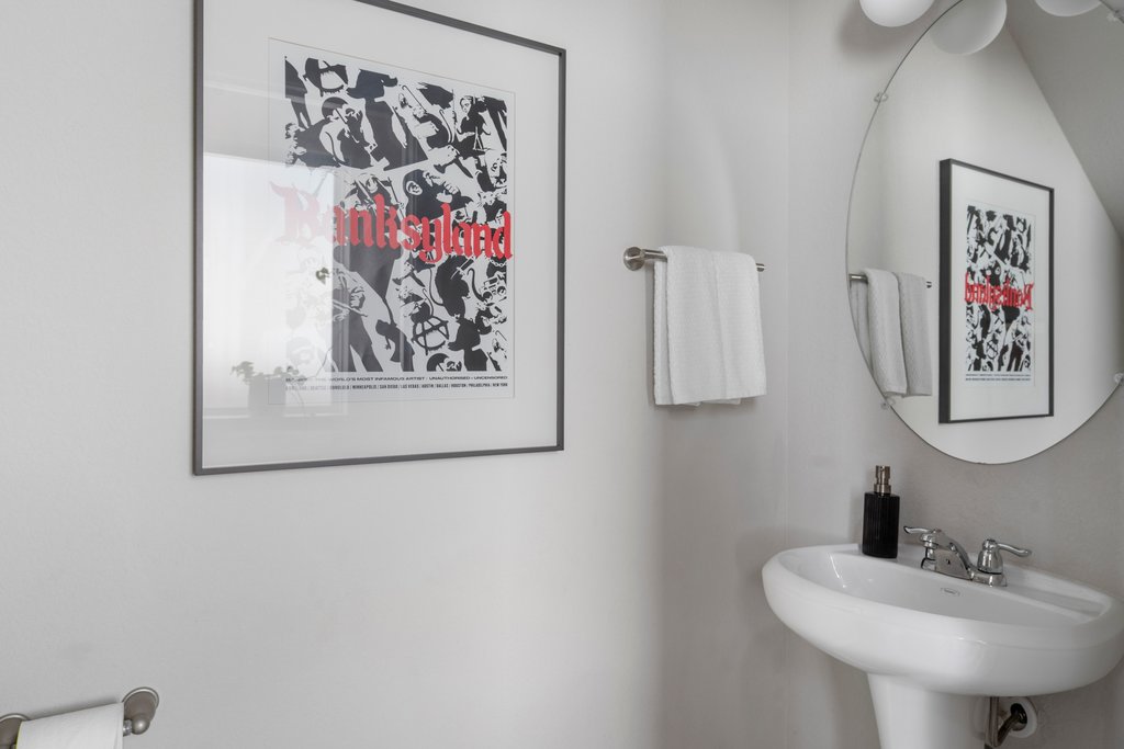610 Bernstein Street, Unit 14 Austin, TX 78745 - Photo 5 of 39 a bathroom with a sink and a mirror
