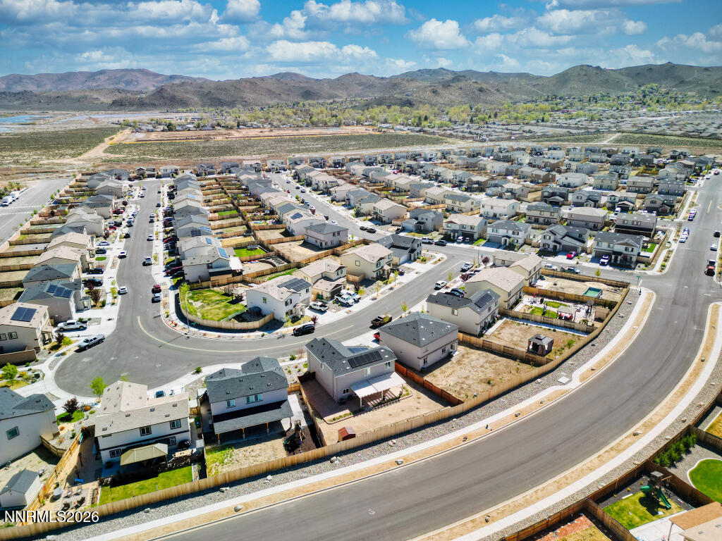 8957 Buffalo Grove Drive Reno, NV 89506 - Photo 59 of 59 an aerial view of residential houses with outdoor space