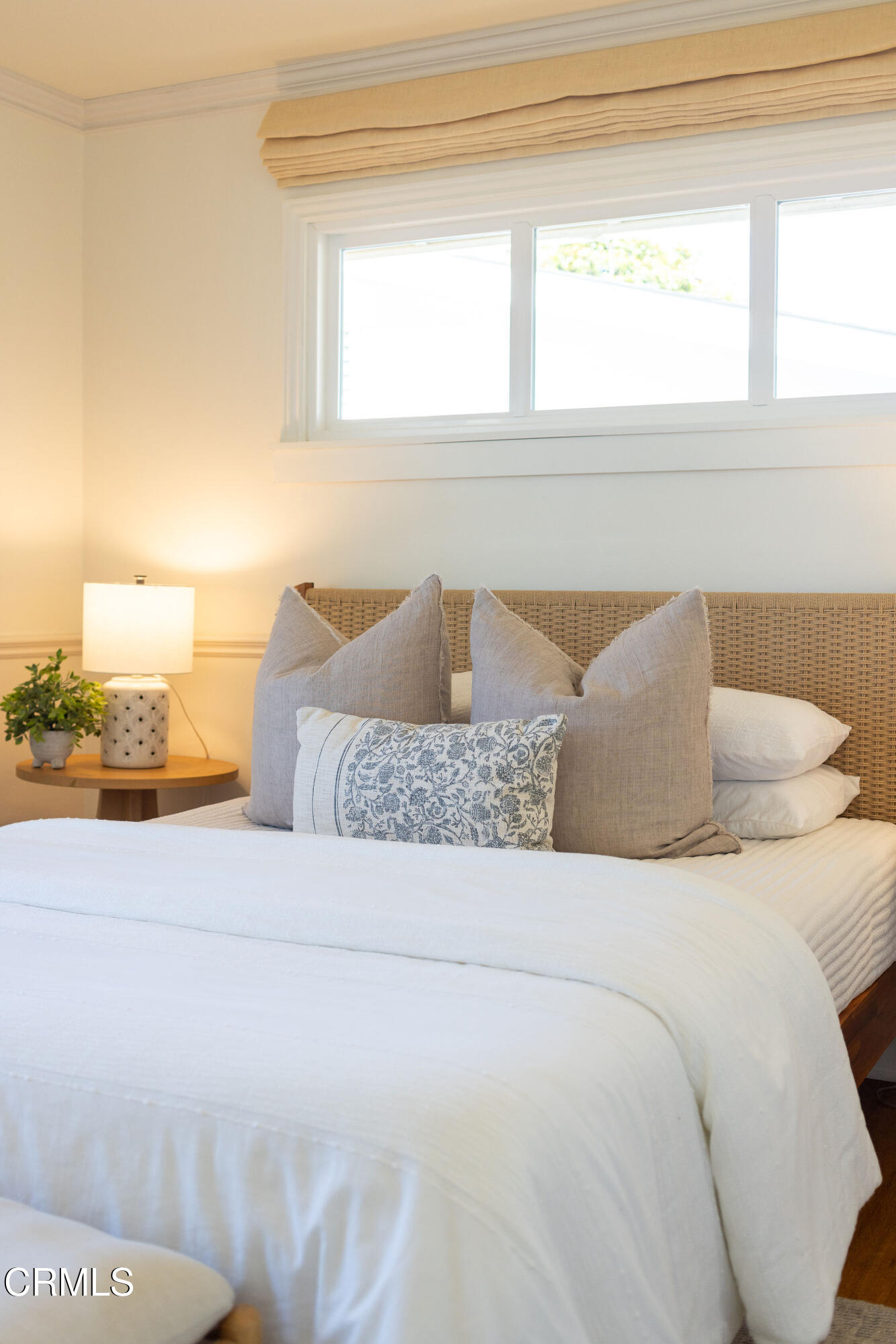 755 Calle Rey Mar Carpinteria, CA 93013 - Photo 11 of 18 a living room with a couch and a floor to ceiling window