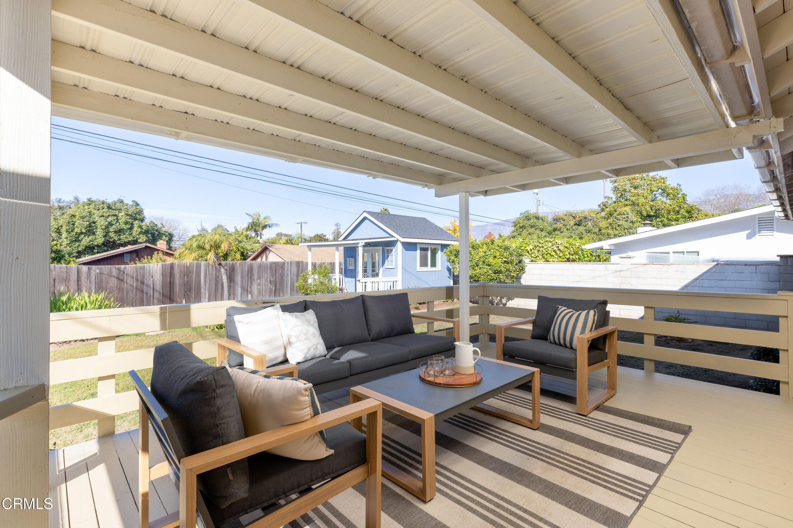 755 Calle Rey Mar Carpinteria, CA 93013 - Photo 14 of 18 a outdoor living space with furniture and a potted plant