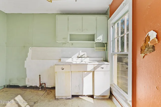 a utility room with a sink