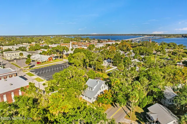an aerial view of residential building with parking space
