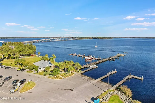 an aerial view of a house with a swimming pool