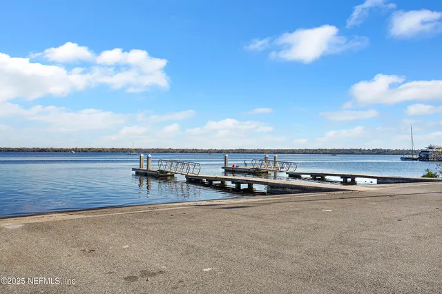 a view of a terrace with beach and ocean view