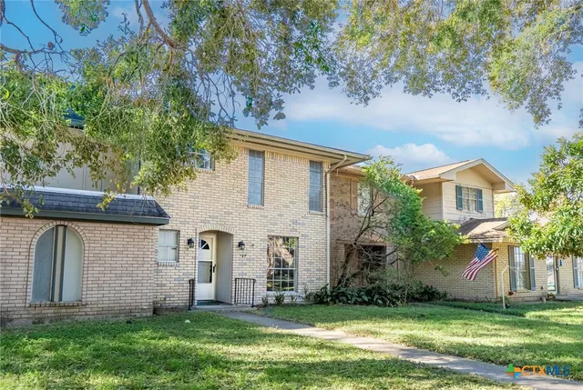 a front view of house with yard
