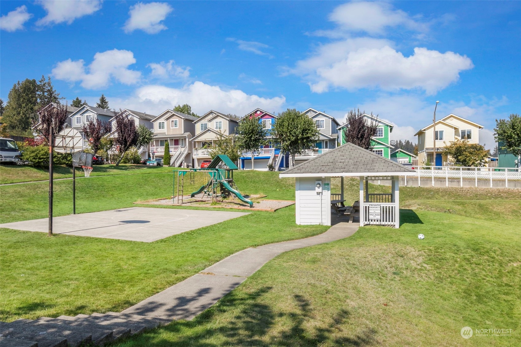 3957 Broadmoor Loop Bremerton, WA 98310 - Photo 23 of 23 a view of a house with a yard