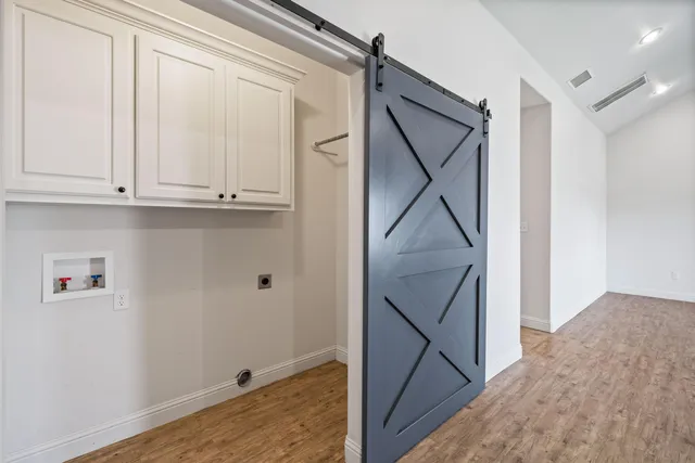 a view of hallway with staircase