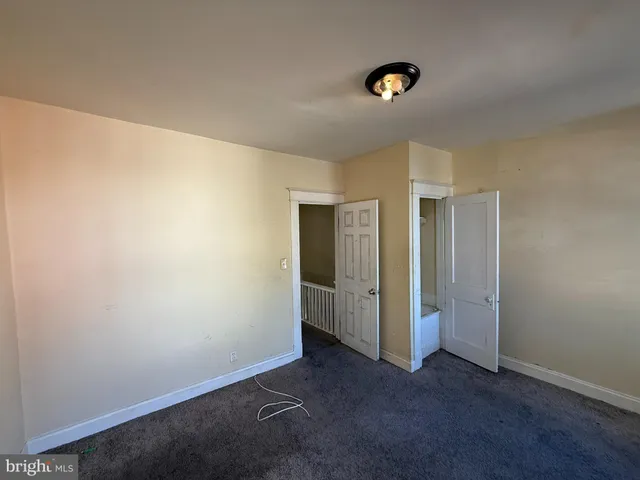 an empty room with closet
