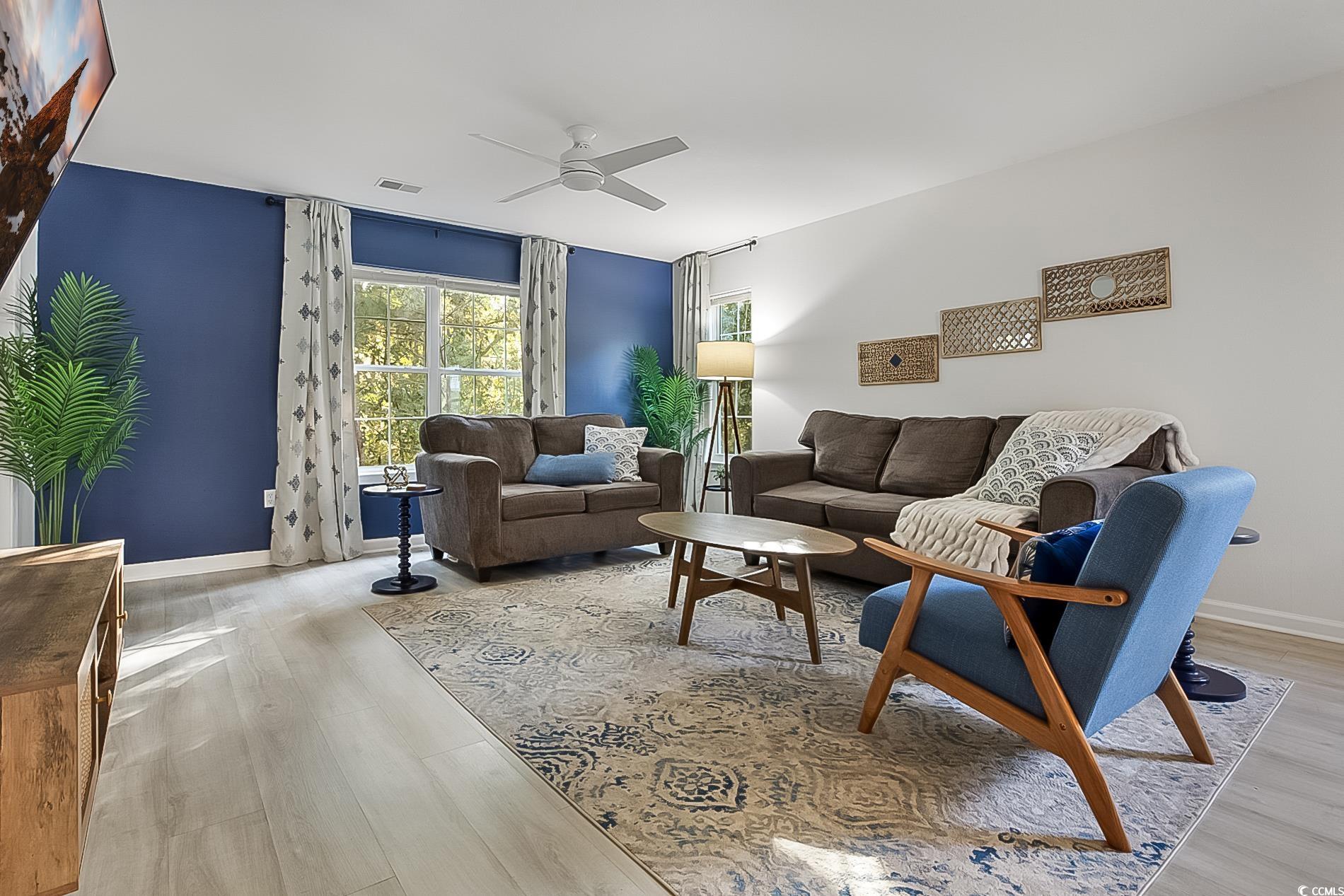 1204 River Oaks Drive, Unit 25D Myrtle Beach, SC 29579 - Photo 2 of 31 Living room featuring light wood-style floors and ceiling fan