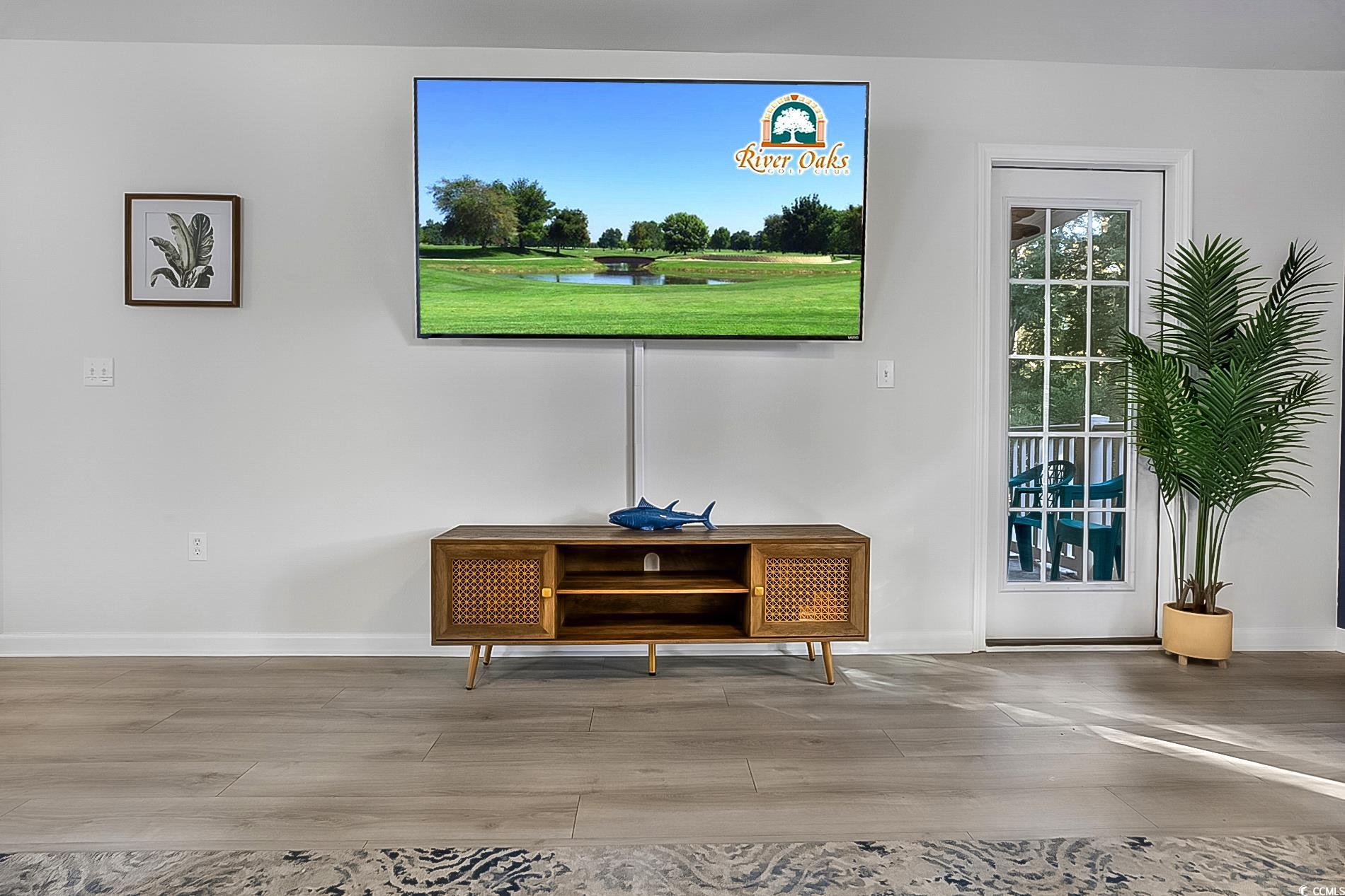 1204 River Oaks Drive, Unit 25D Myrtle Beach, SC 29579 - Photo 25 of 31 Detailed view of baseboards and wood finished floors