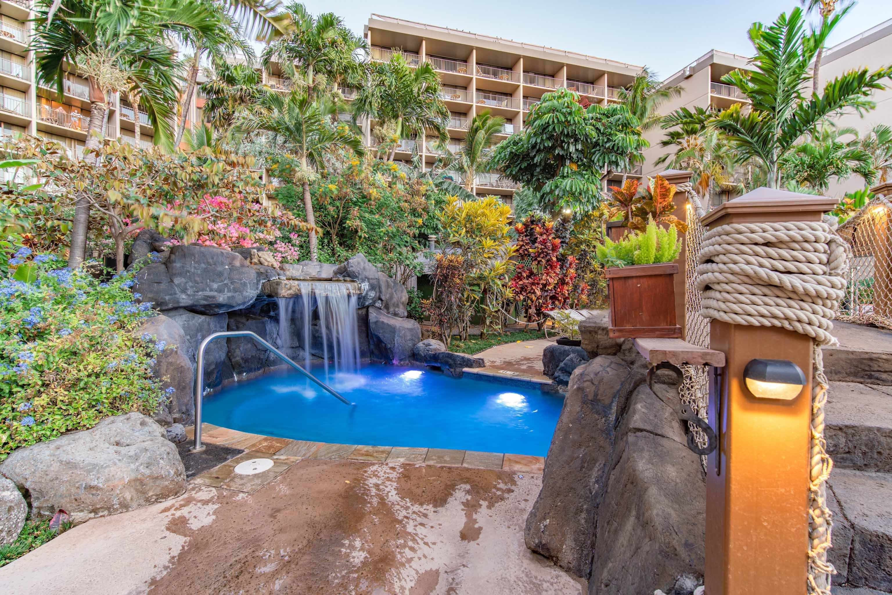 3445 Lower Honoapiilani Road, Unit 434 Lahaina, HI 96761 - Photo 26 of 46 a view of swimming pool with a patio and plants