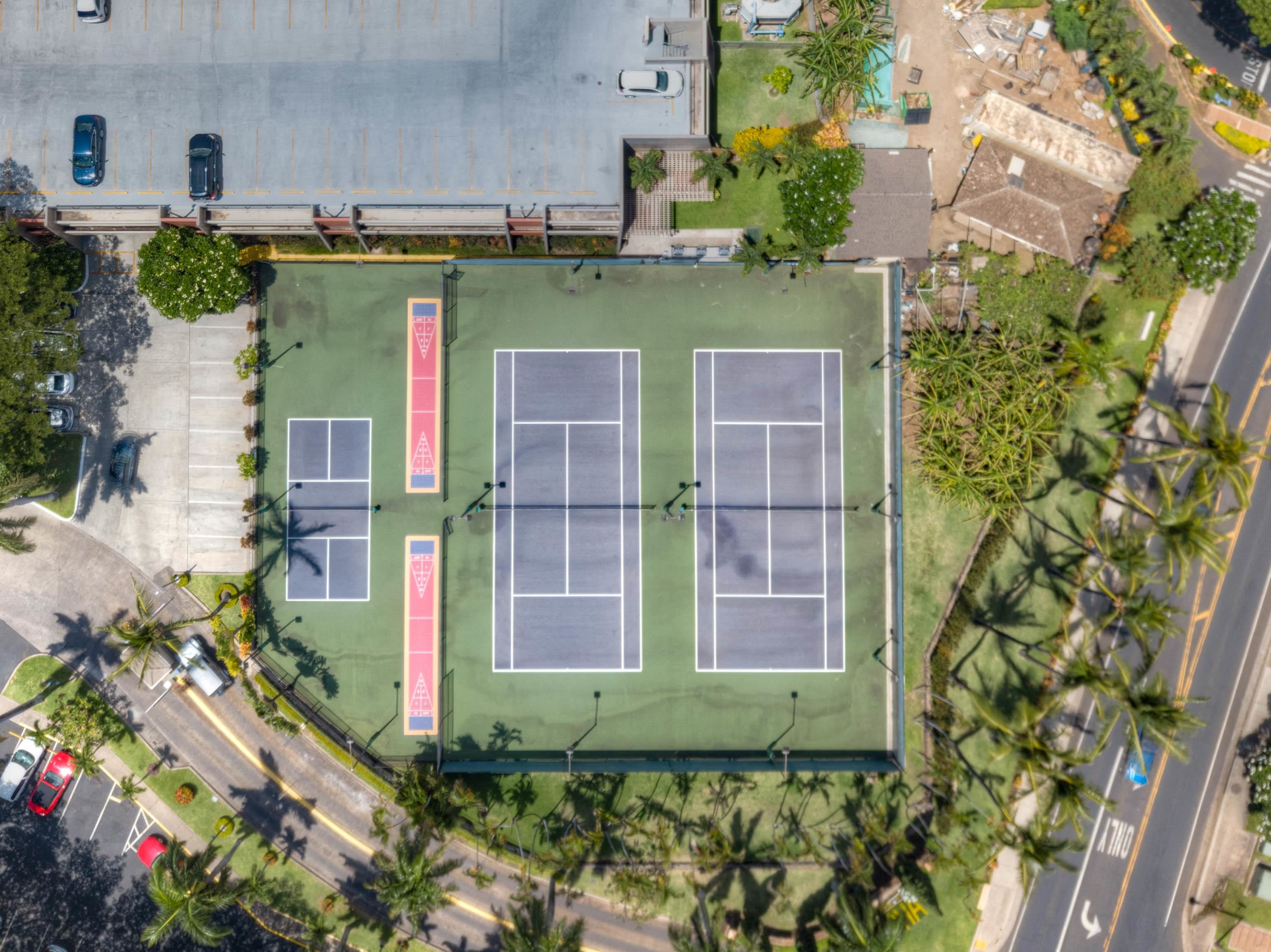 3445 Lower Honoapiilani Road, Unit 434 Lahaina, HI 96761 - Photo 33 of 46 an aerial view of a house with a yard