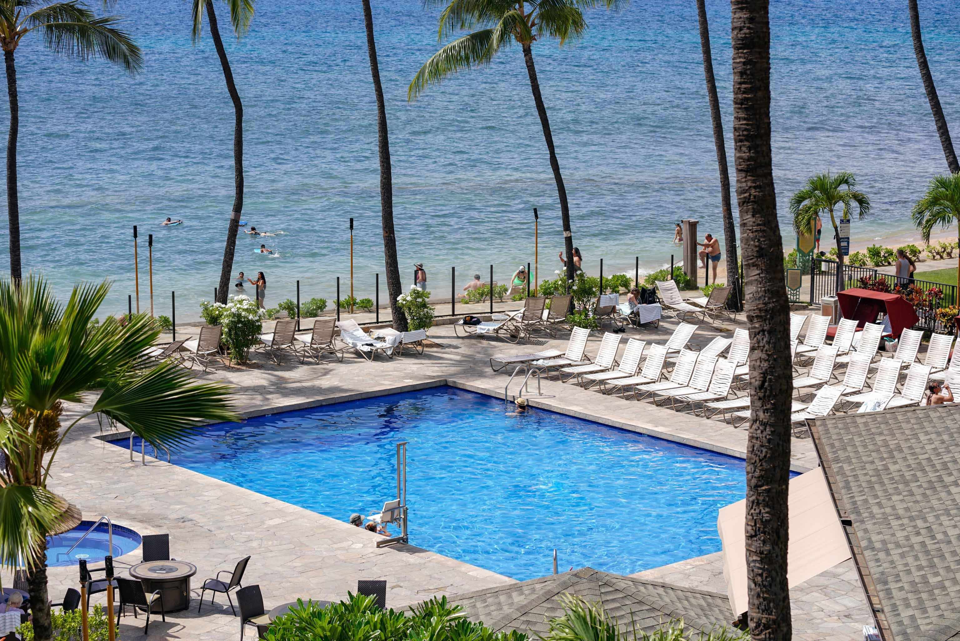 3445 Lower Honoapiilani Road, Unit 434 Lahaina, HI 96761 - Photo 38 of 46 a view of swimming pool with outdoor seating