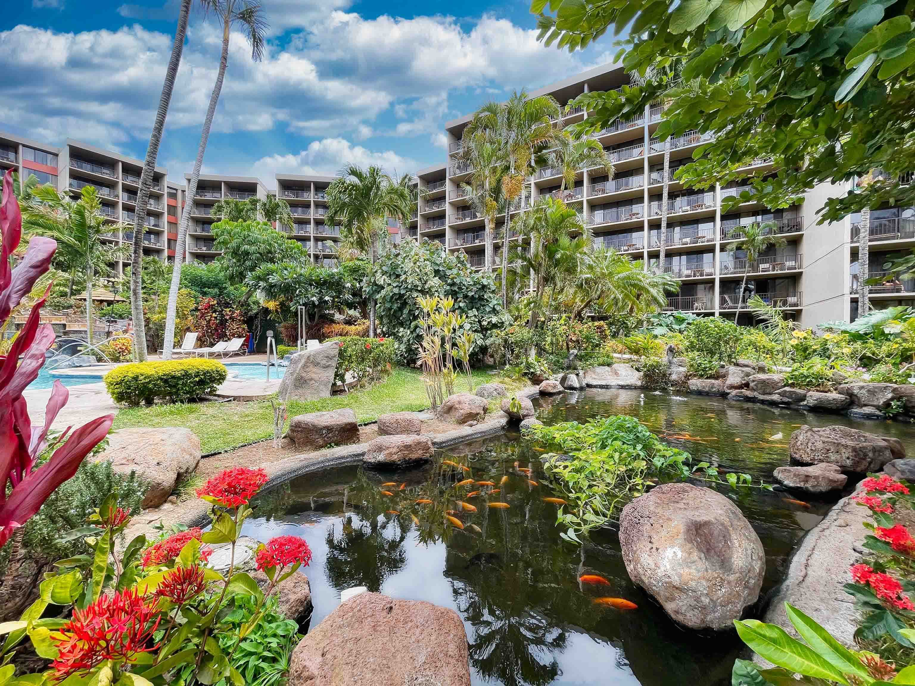 3445 Lower Honoapiilani Road, Unit 434 Lahaina, HI 96761 - Photo 41 of 46 a view of yard with swimming pool and outdoor seating