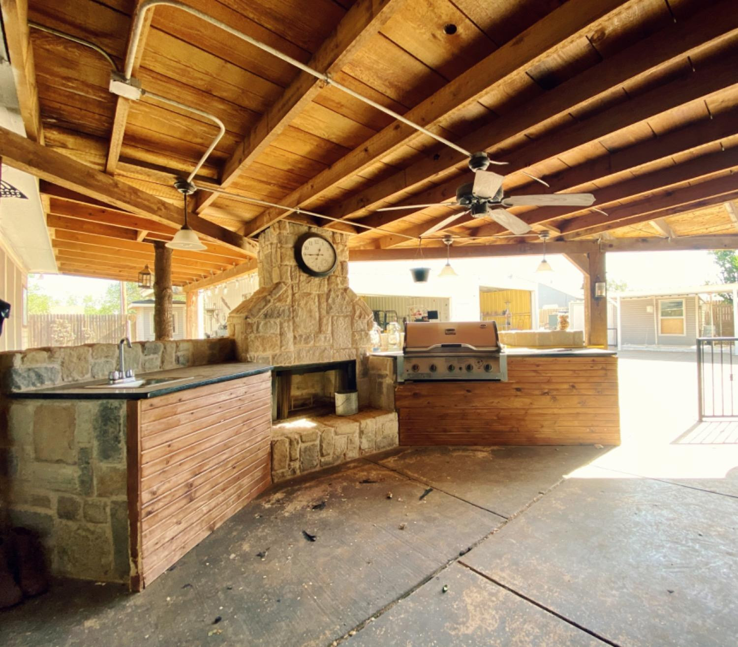 616 30th Street Lubbock, TX 79404 - Photo 11 of 23 Back Patio / Outdoor Kitchen