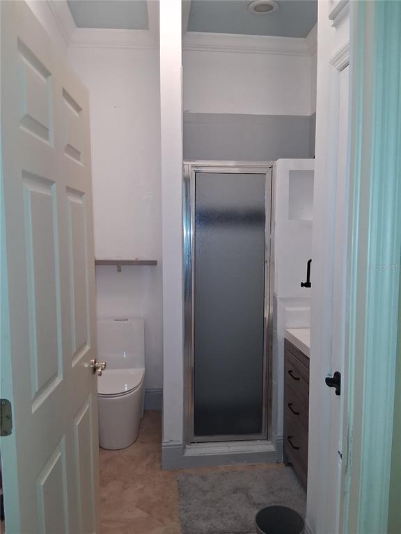 915 Old Welcome Road Lithia, FL 33547 - Photo 14 of 23 a bathroom with a granite countertop toilet and a sink