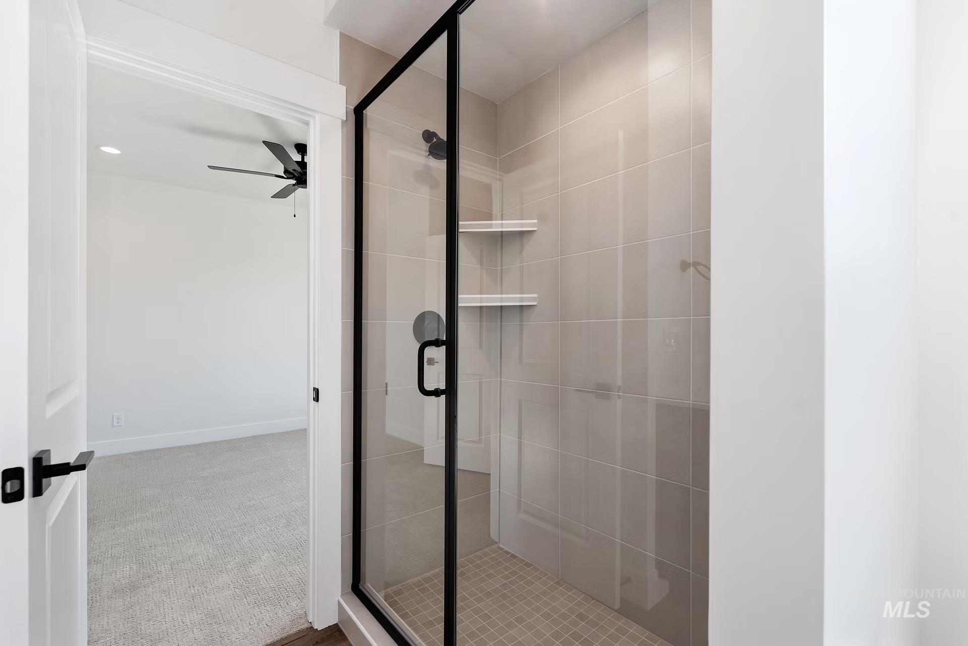 716 South Calhoun Lane Star, ID 83669 - Photo 13 of 23 Bathroom featuring a shower stall, recessed lighting, and ceiling fan