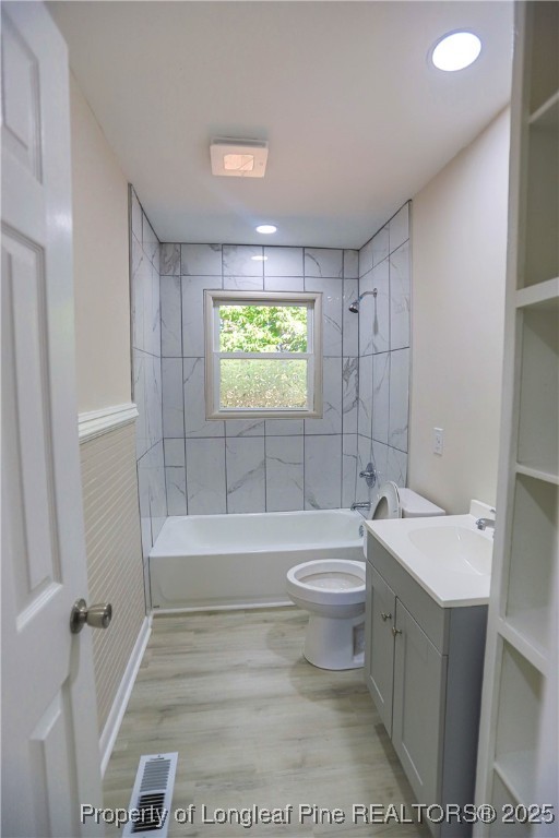 222 Odell Road Spring Lake, NC 28390 - Photo 13 of 17 a bathroom with a sink a toilet and shower