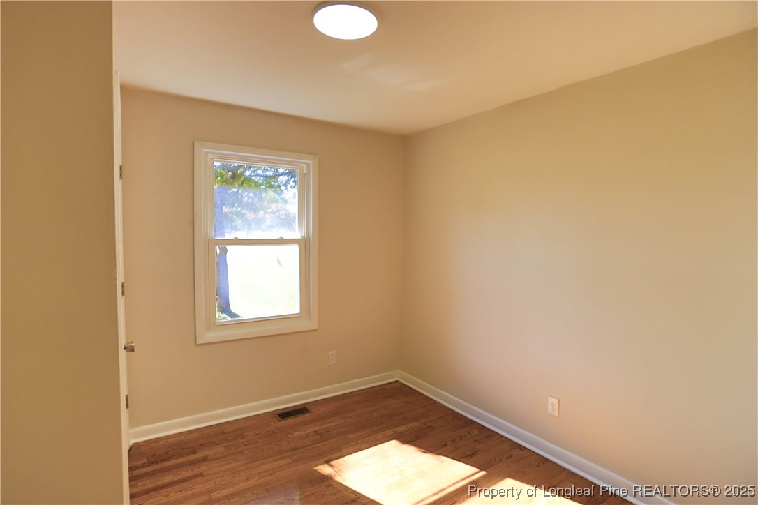 222 Odell Road Spring Lake, NC 28390 - Photo 8 of 17 a view of empty room with window