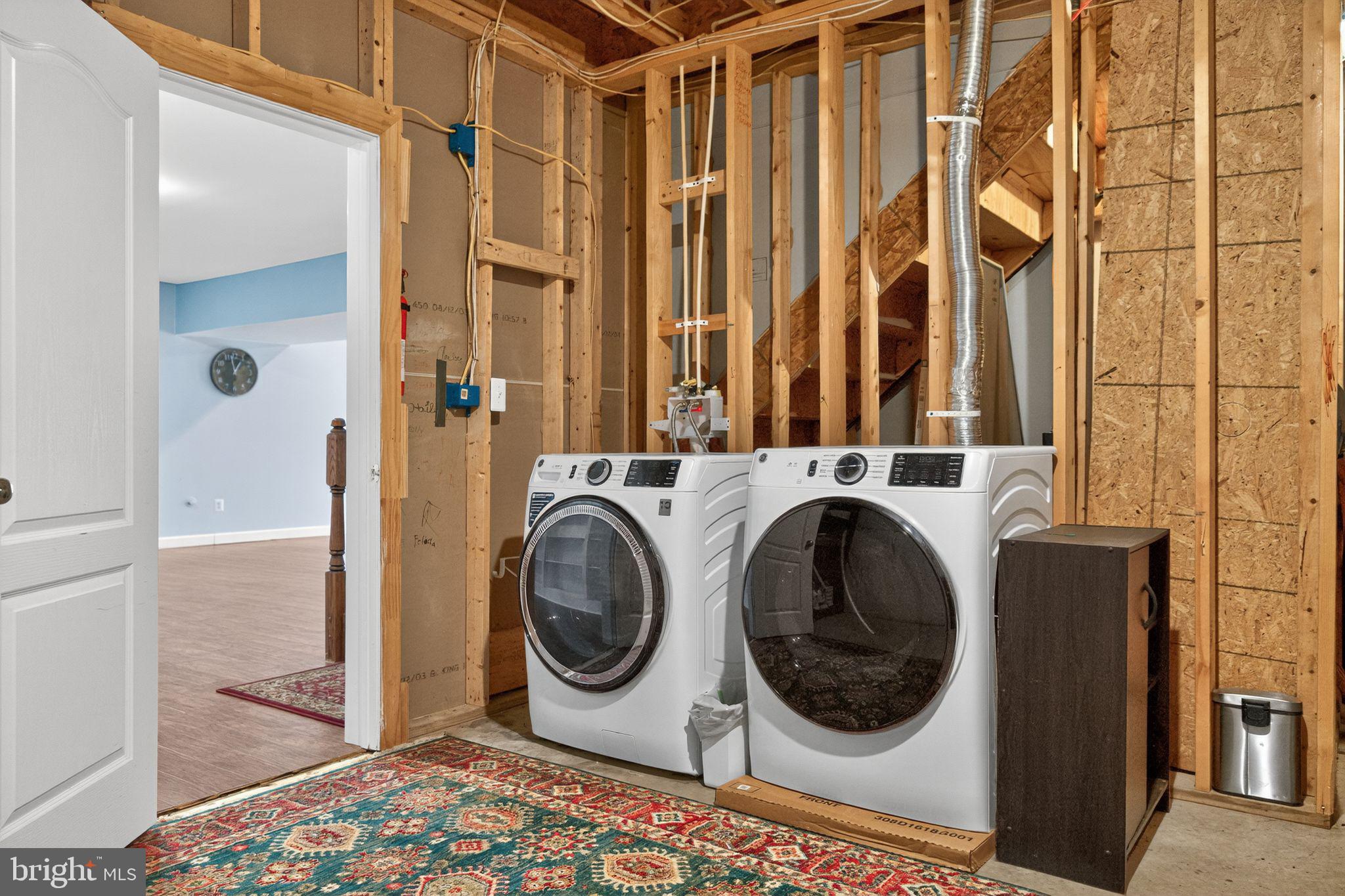 1 Pondsedge Court Stafford, VA 22554 - Photo 16 of 18 a utility room with dryer and washer