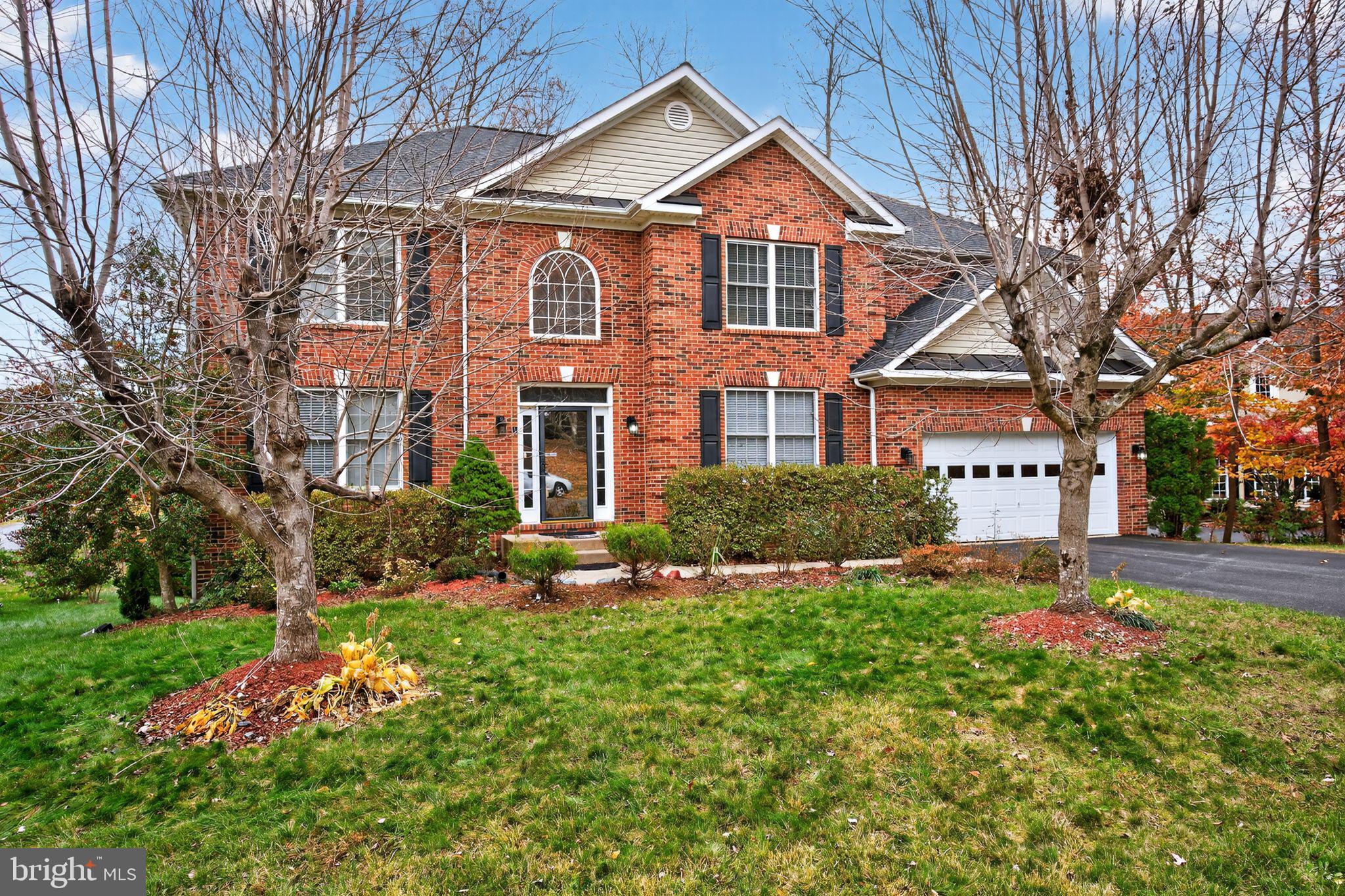 1 Pondsedge Court Stafford, VA 22554 - Photo 17 of 18 a front view of a house with a yard