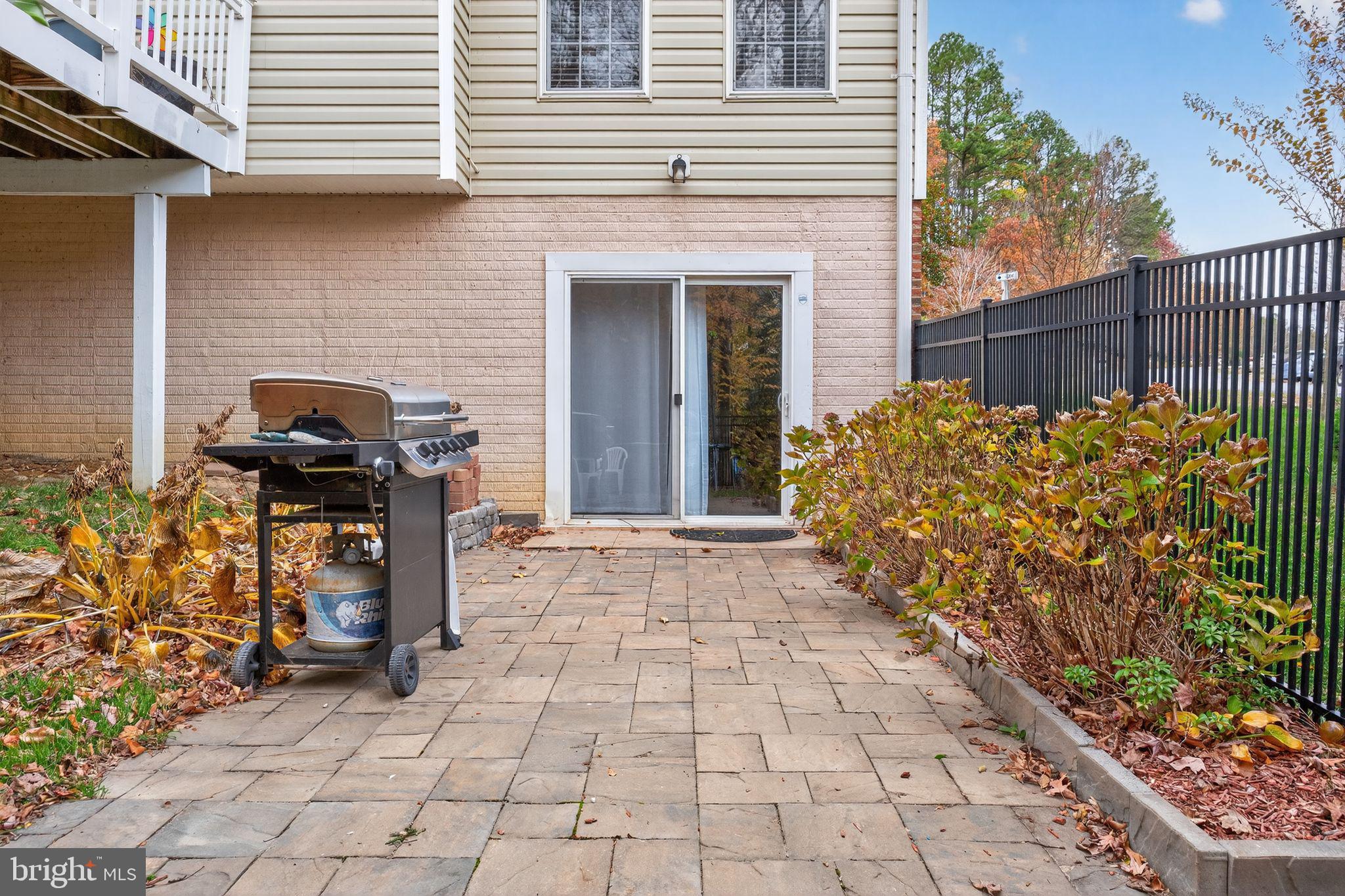 1 Pondsedge Court Stafford, VA 22554 - Photo 2 of 18 a front view of a house with garden
