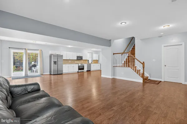 a view of livingroom with furniture and wooden floor