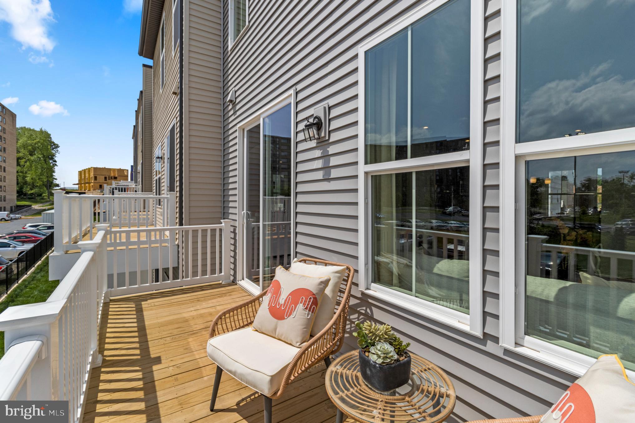 3603 St Amy Way Bowie, MD 20716 - Photo 11 of 42 a balcony with table and chairs