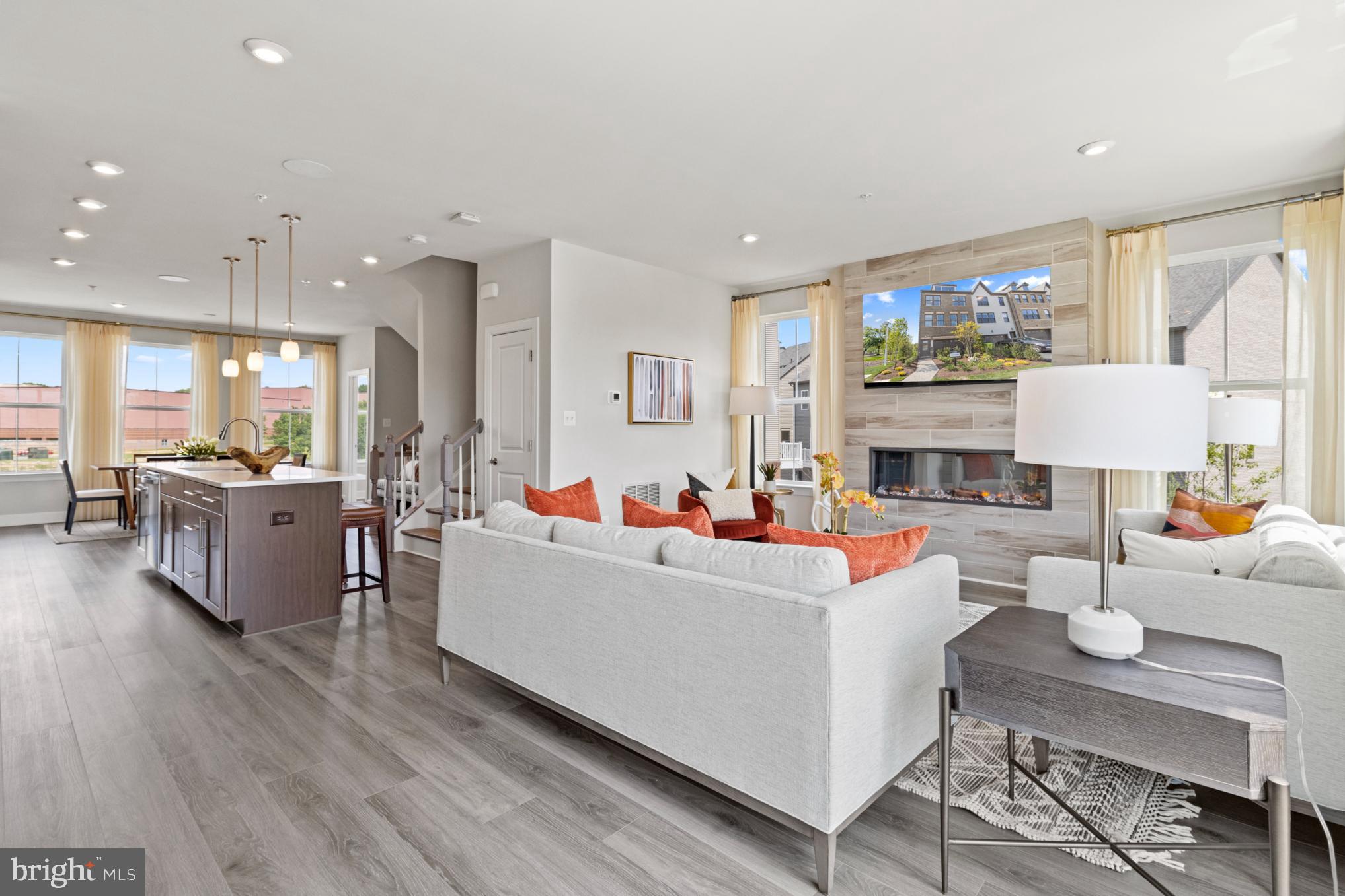 3603 St Amy Way Bowie, MD 20716 - Photo 4 of 42 a living room with furniture and a table