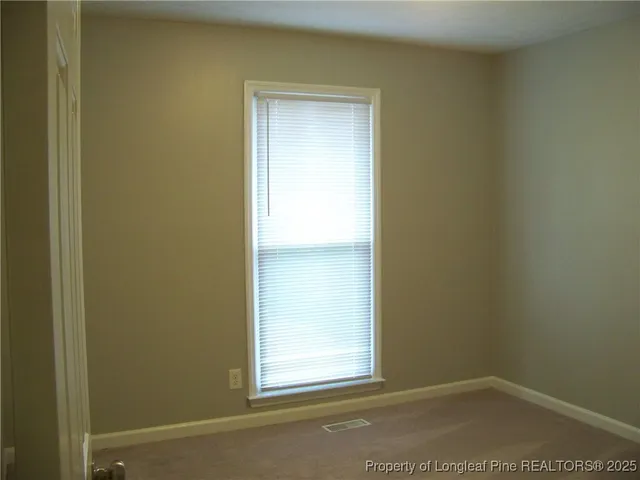 a view of a window in an empty room