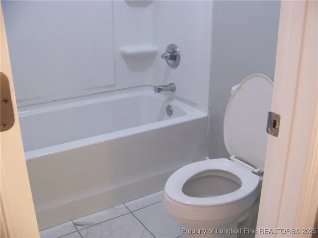 a view of backyard with green space