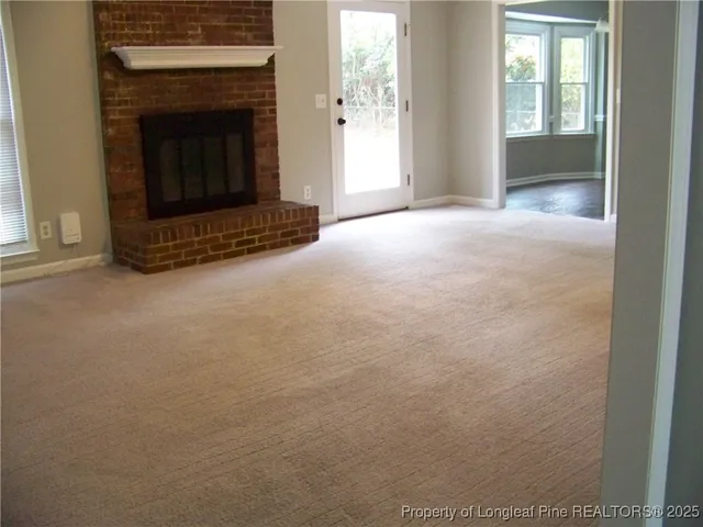 a living room with a fireplace