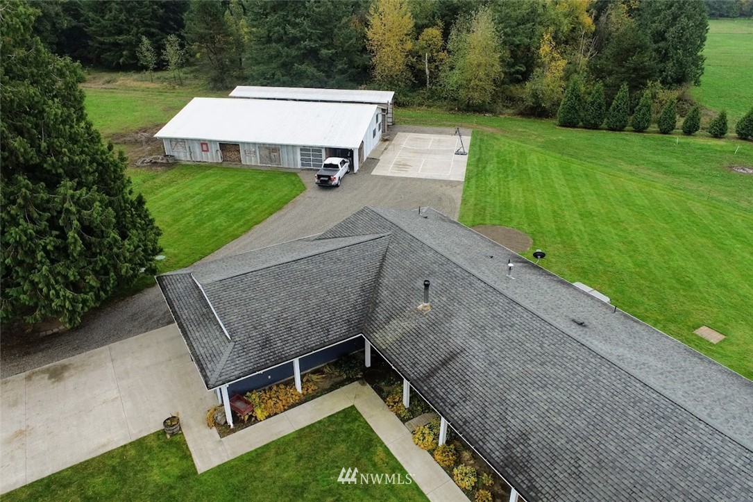 2091 Zell Road Ferndale, WA 98248 - Photo 24 of 25 a view of a backyard with sitting area
