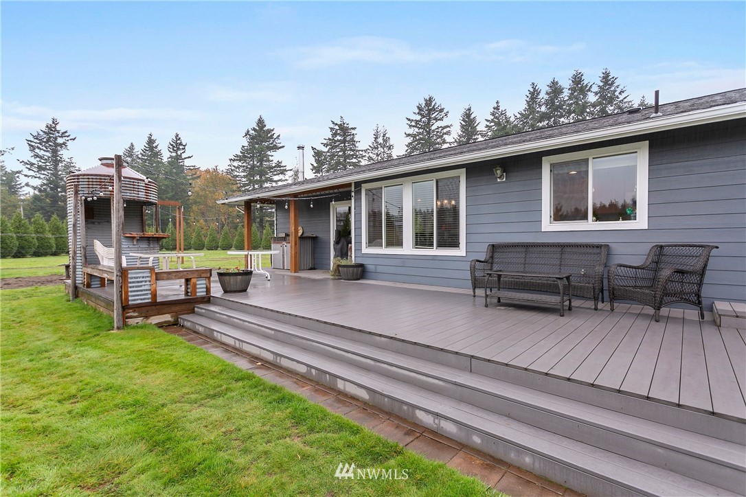 2091 Zell Road Ferndale, WA 98248 - Photo 4 of 25 a view of a house with backyard and sitting area