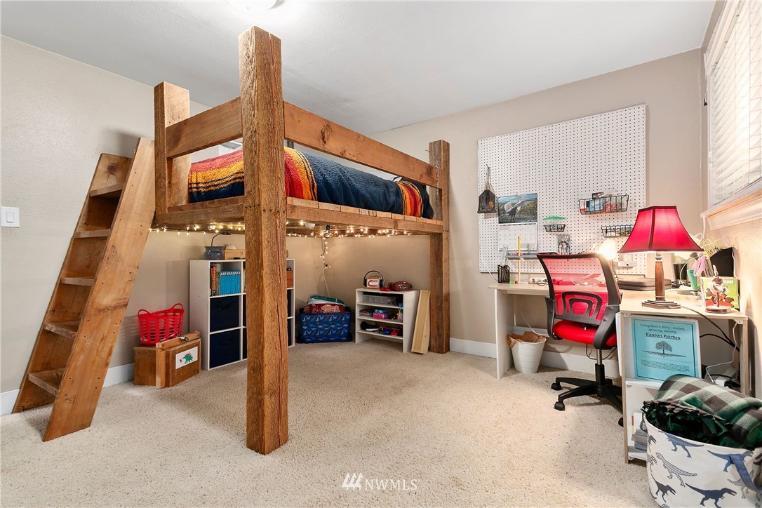 2091 Zell Road Ferndale, WA 98248 - Photo 10 of 25 a bedroom with furniture and workout equipment