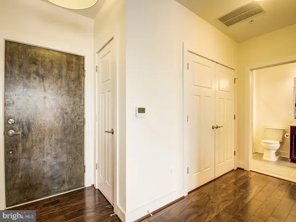 a view of a bathroom with a glass door