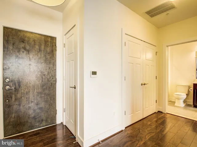a view of a bathroom with a glass door