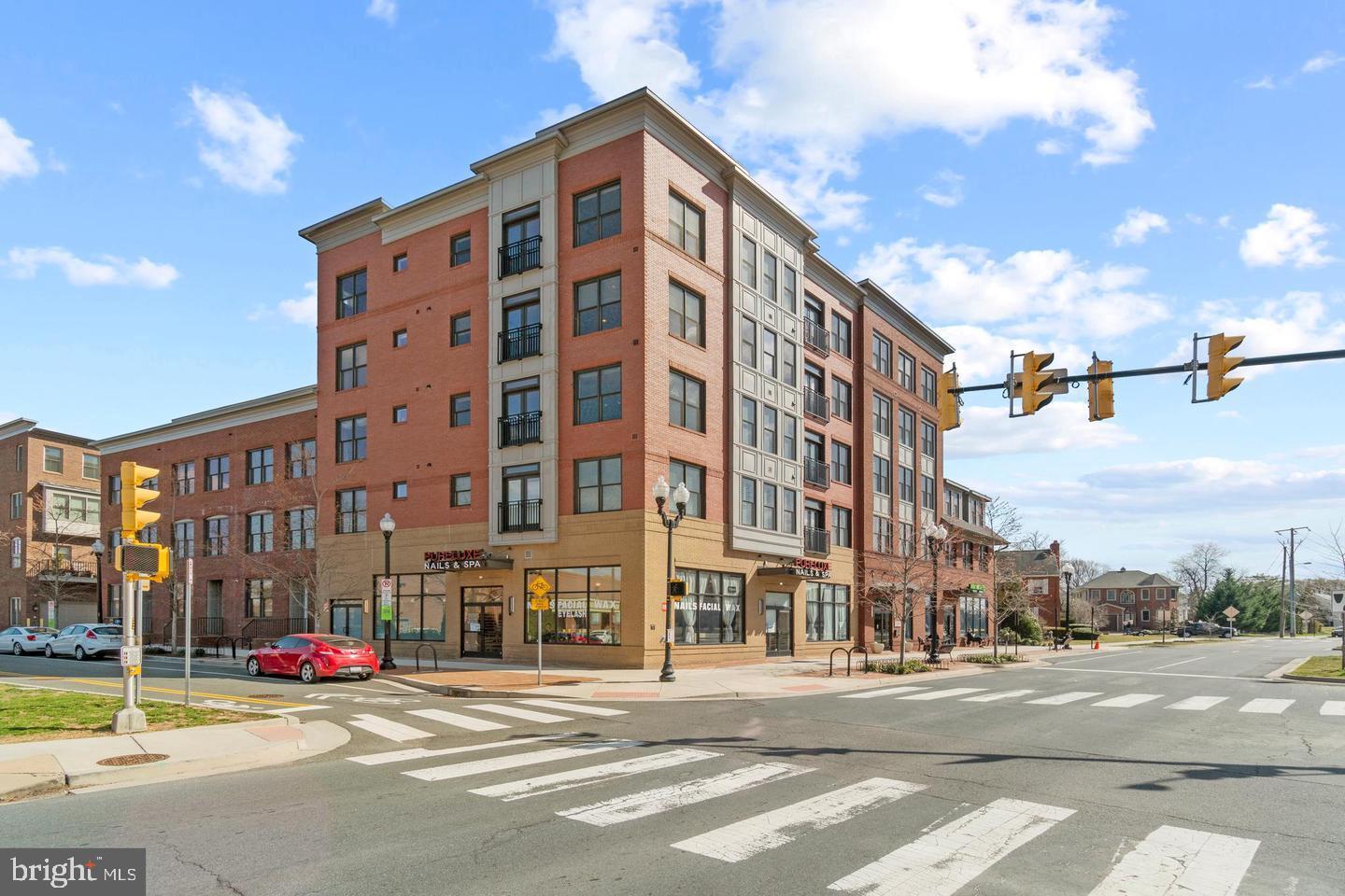 1107 South Walter Reed Drive, Unit 302 Arlington, VA 22204 - Photo 2 of 50 a view of a building and a street