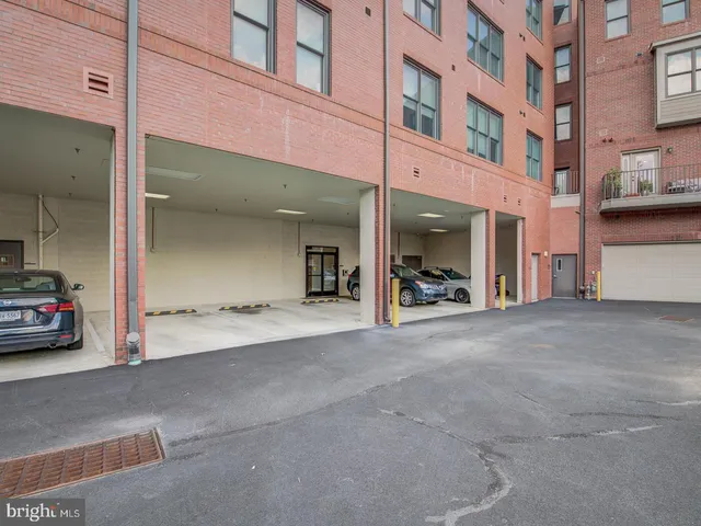 a view of a building with a street