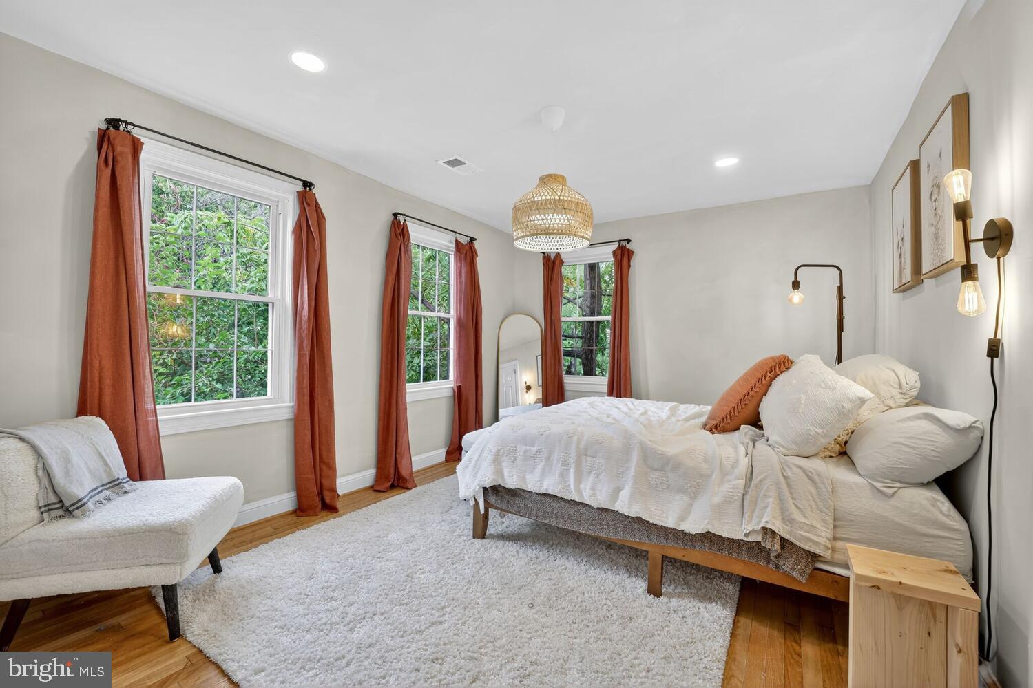 6017 Inwood Street Landover, MD 20785 - Photo 6 of 33 a bedroom with a bed and large windows